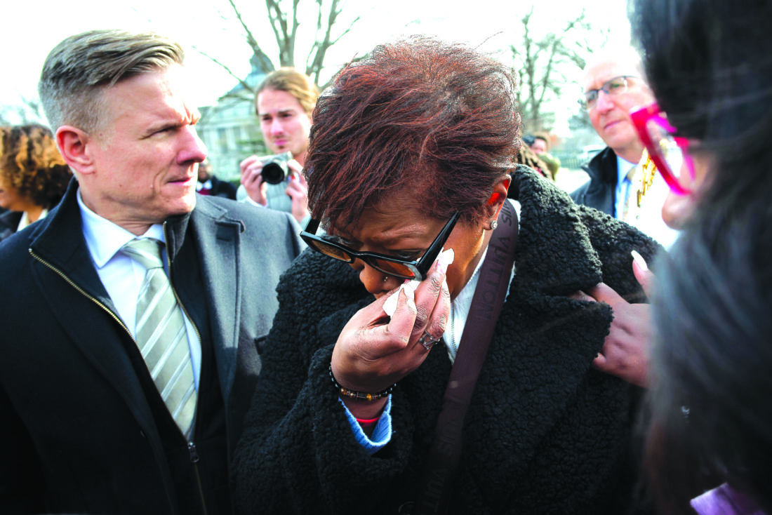 Relatives of a man killed by Ohio police are settling their lawsuit